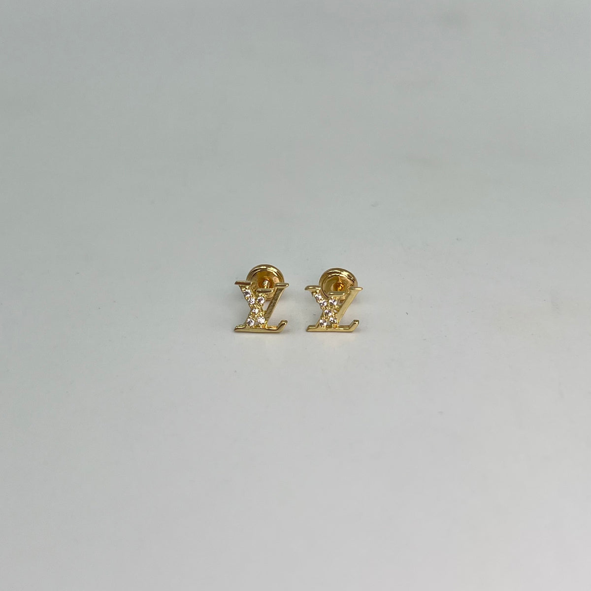 TOPOS LV SILUETA CIRCONES BLANCOS ORO AMARILLO 18K 0,96 GR / 7 MM