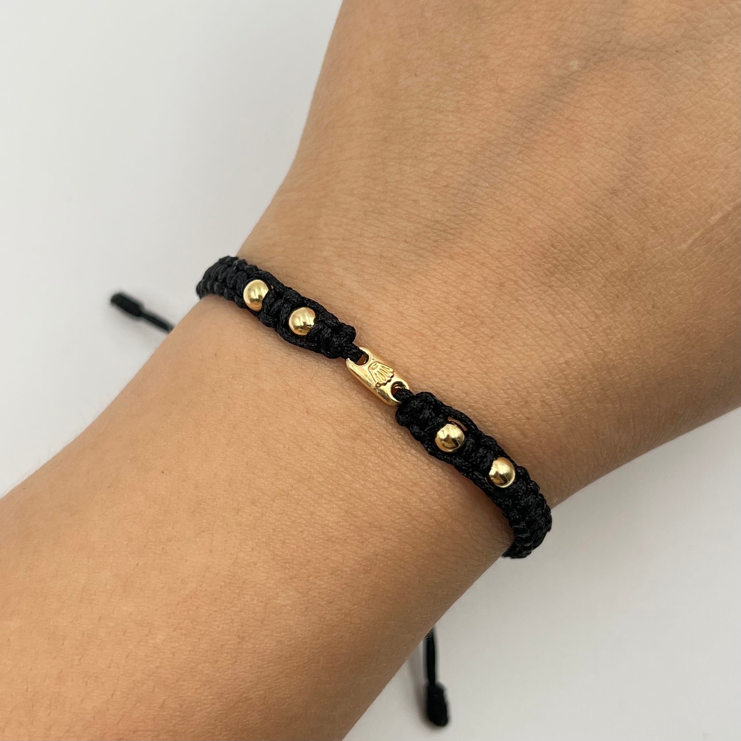 PULSERA TEJIDA NEGRA / HERRAJE RX / BOLA LISA 4MM