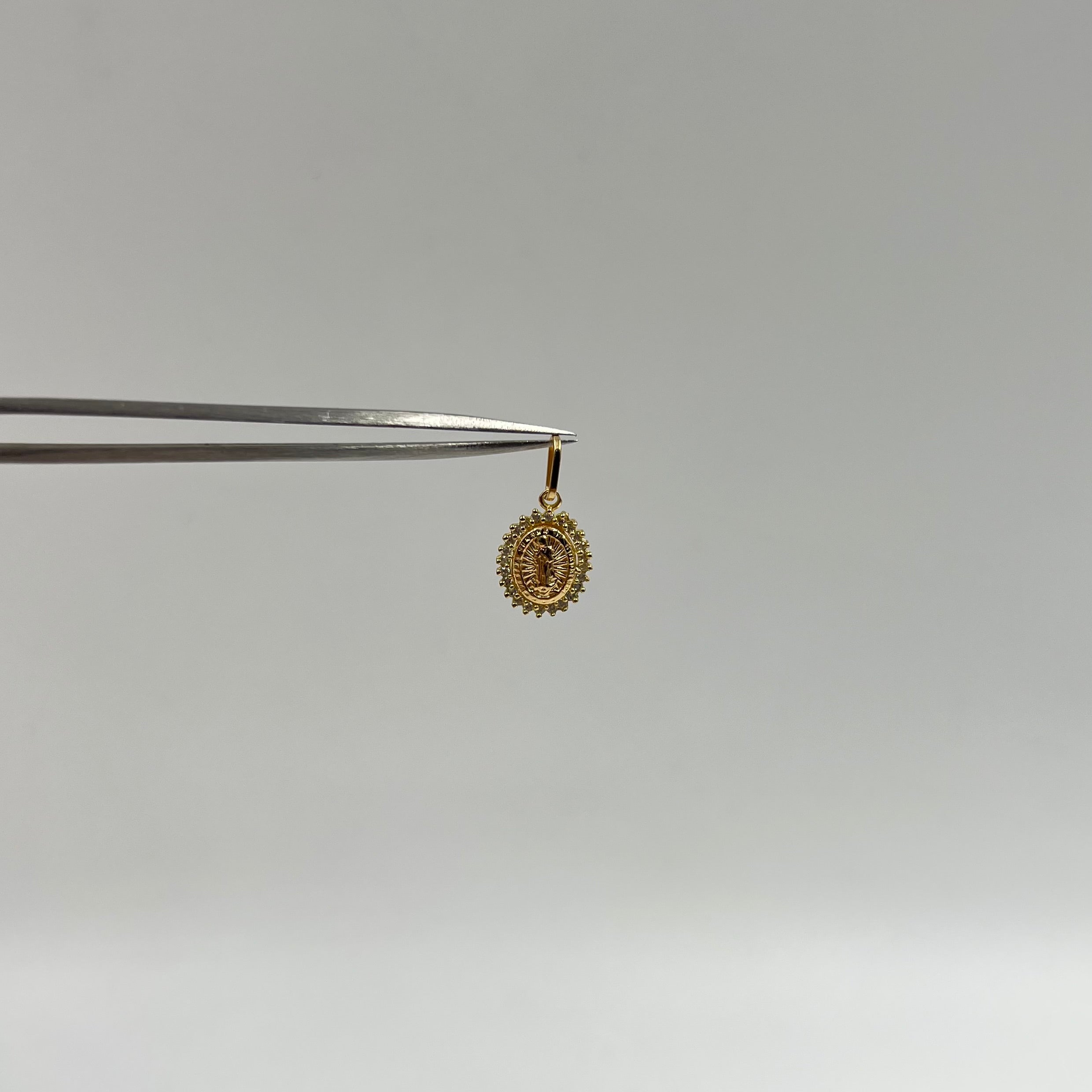DIJE VIRGEN DE GUADALUPE CASTING CLANCO   ORO AMARILLO 18K +1 / 0,65 GR / 9 MM / 1,3 CM