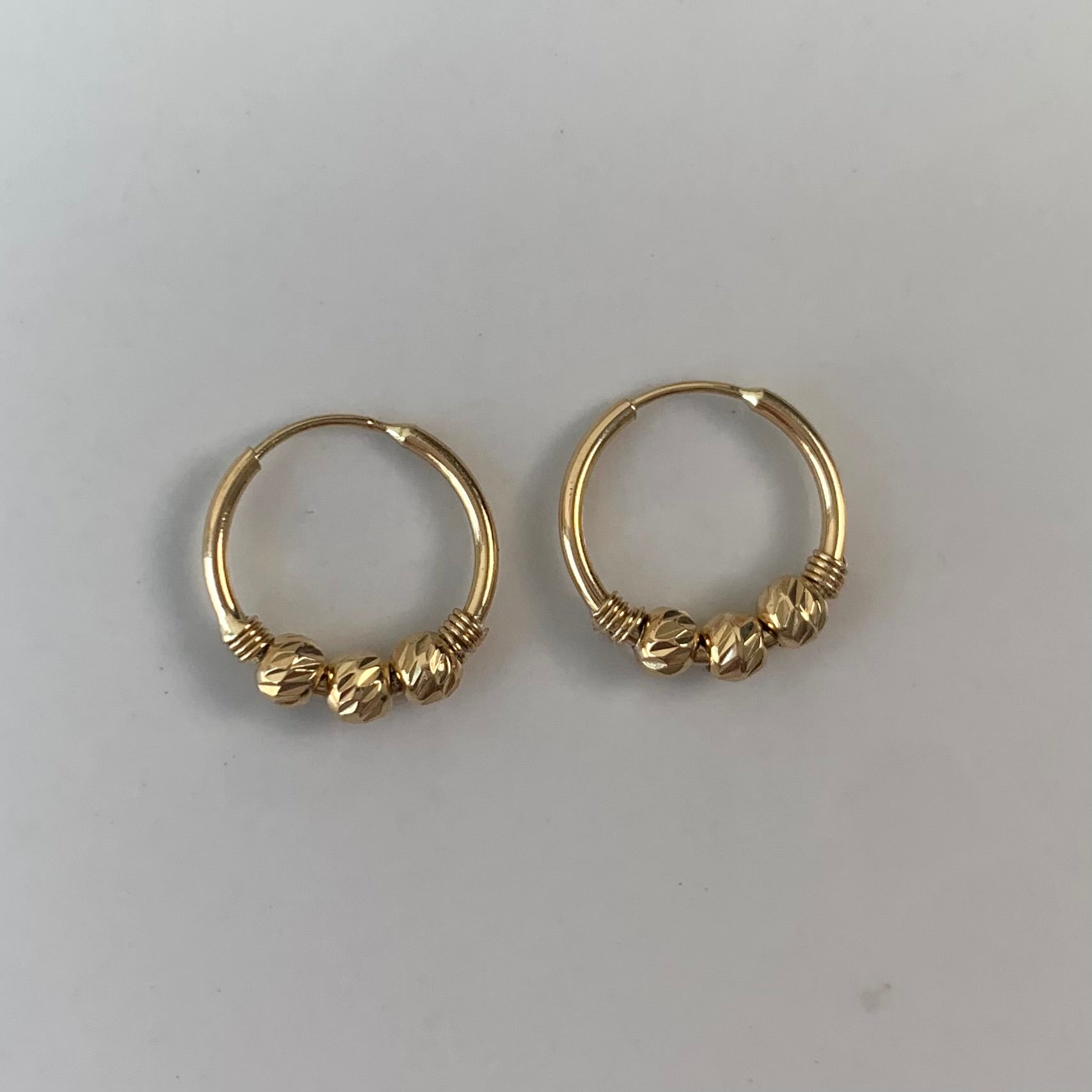 CANDONGA IMPERDIBLES BOLAS ORO AMARILLO 18K 1 GR / 1,6 CM