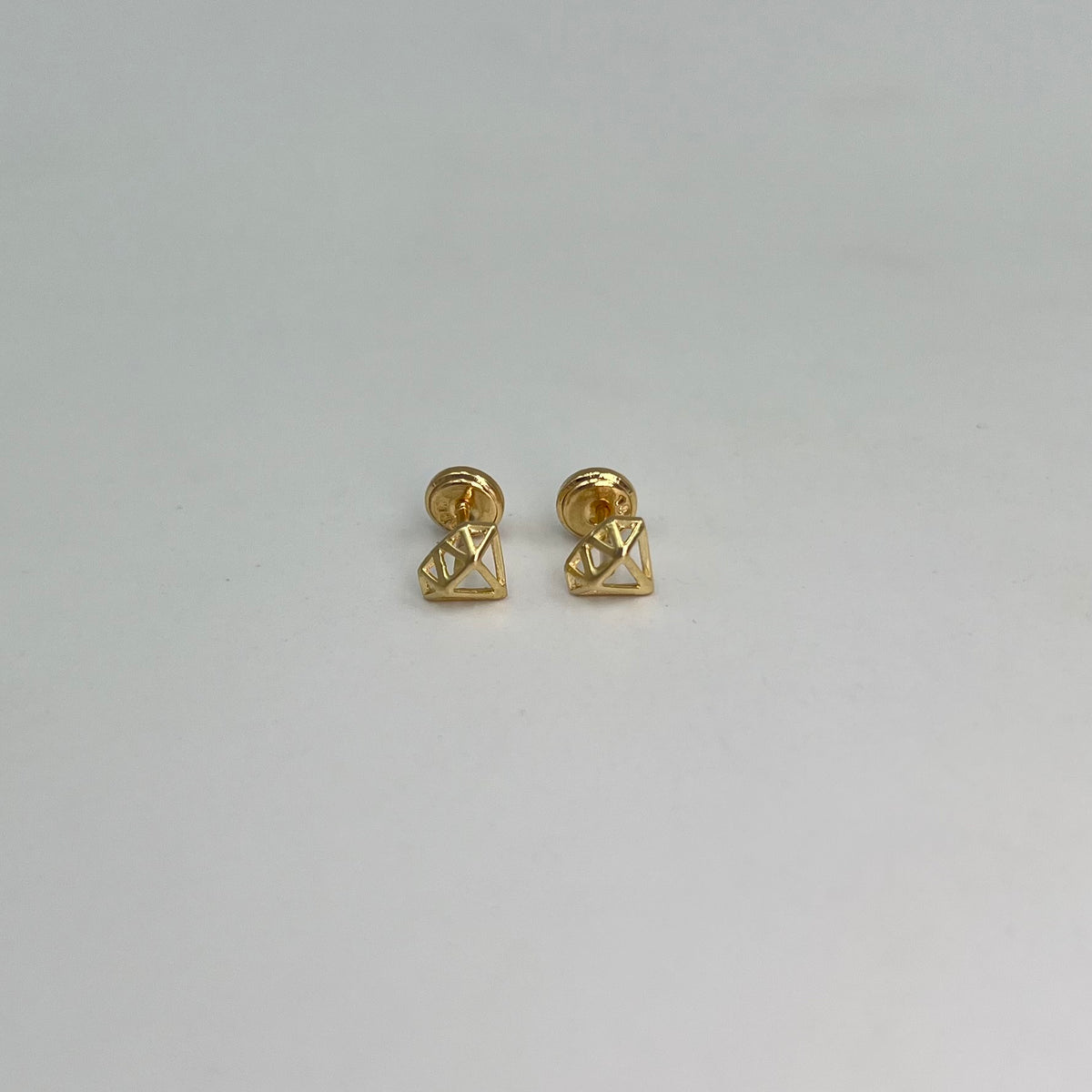 TOPOS LISOS SILUETA DIAMANTE  ORO AMARILLO 18K 0,71 GR / 7 MM