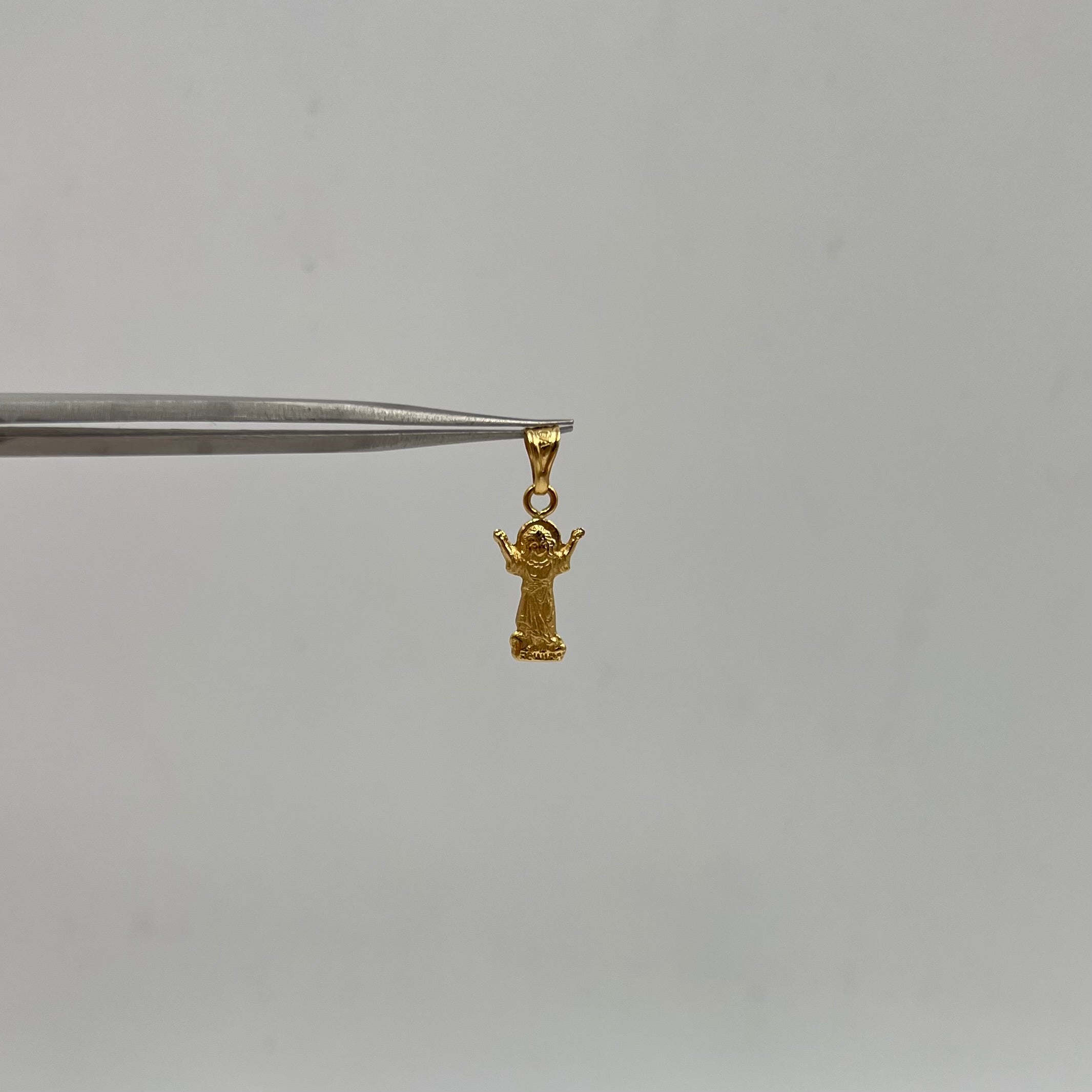 DIJE DIVINO NIÑO  ORO AMARILLO 18K 0,36 GR / 0,8 MM / 1,6 CM