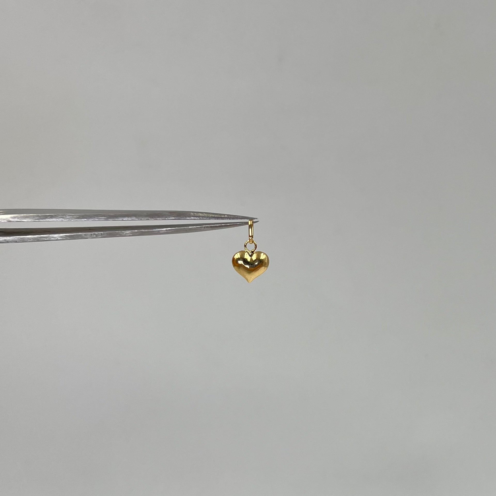 DIJE CORAZON ORO AMARILLO 18K 0,30 GR / 7 MM / 0,8 CM