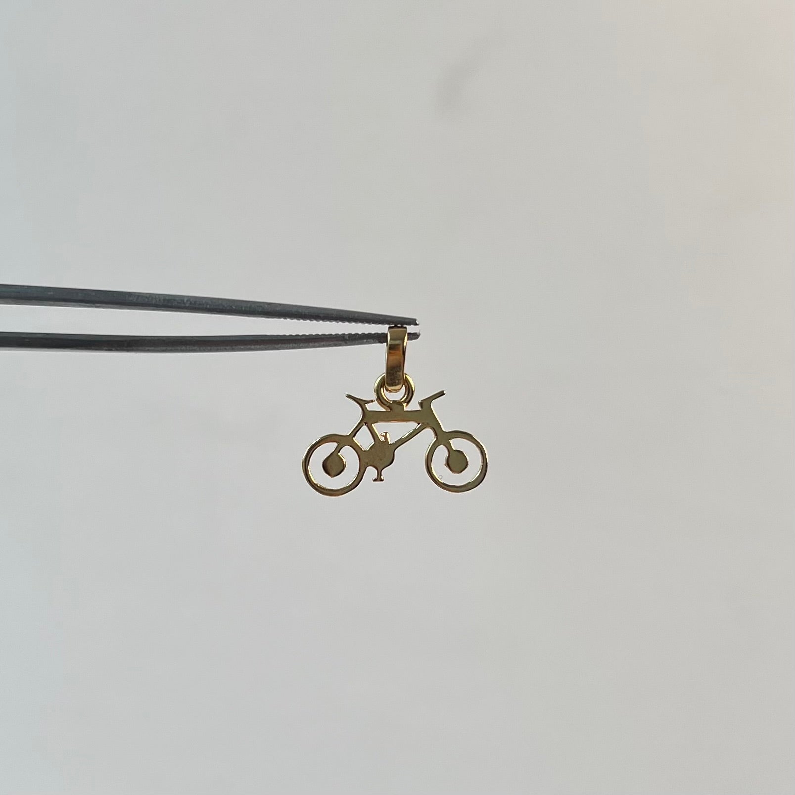 DIJE BICICLETA ORO AMARILLO 18K 1 GR / 17 MM / 1,1 CM