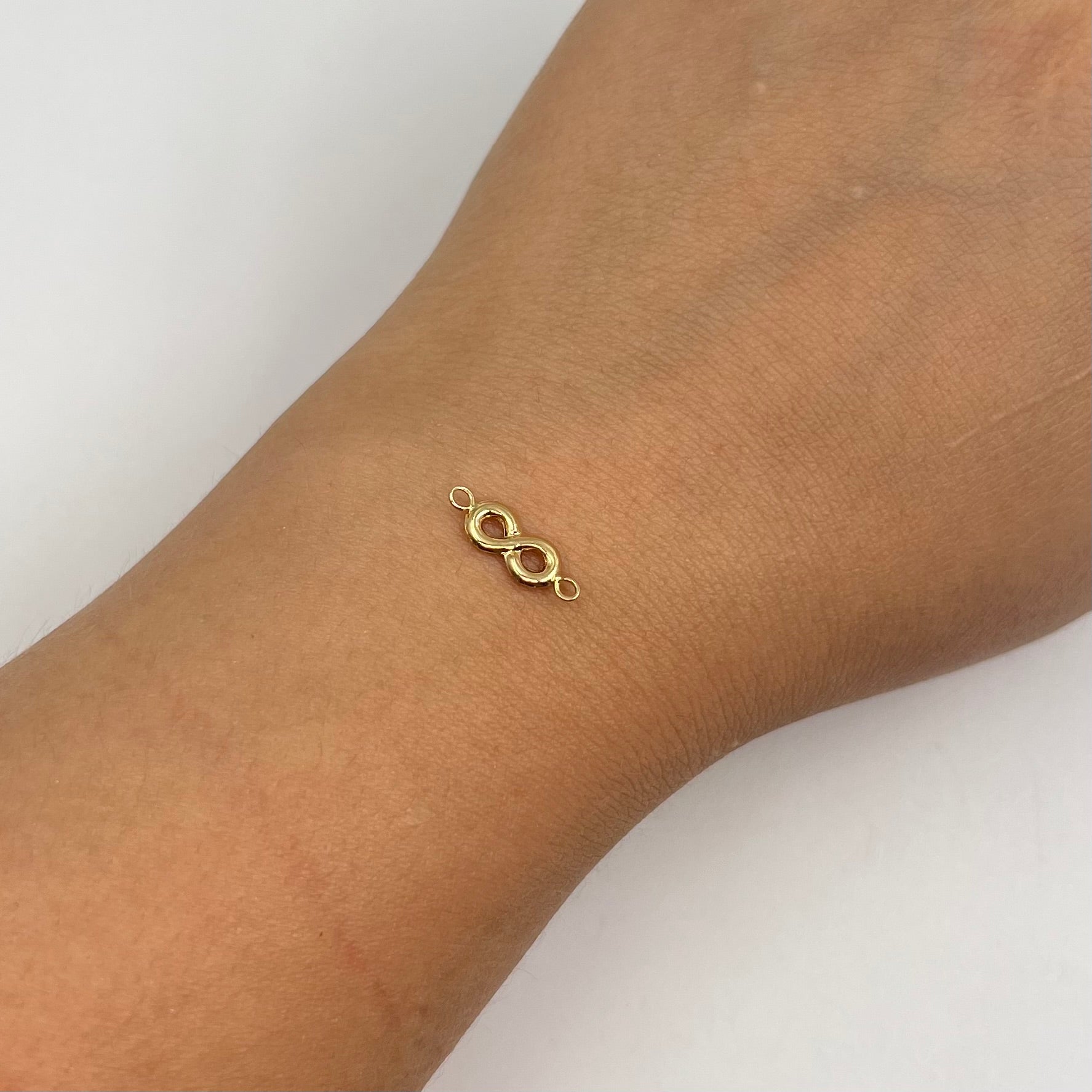 HERRAJE INFINITO ORO AMARILLO 18K +1 / 0,25 GR / 1,4 CM