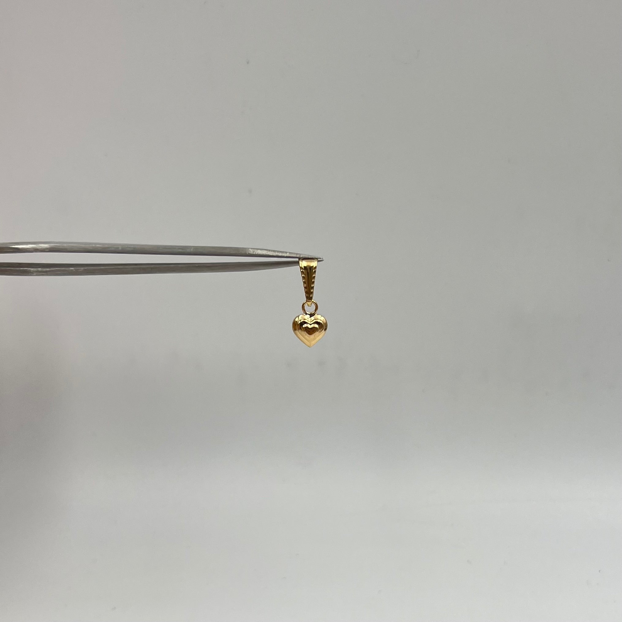 DIJE CORAZON  ORO AMARILLO 18K 0,39 GR / 6 MM / 1 CM