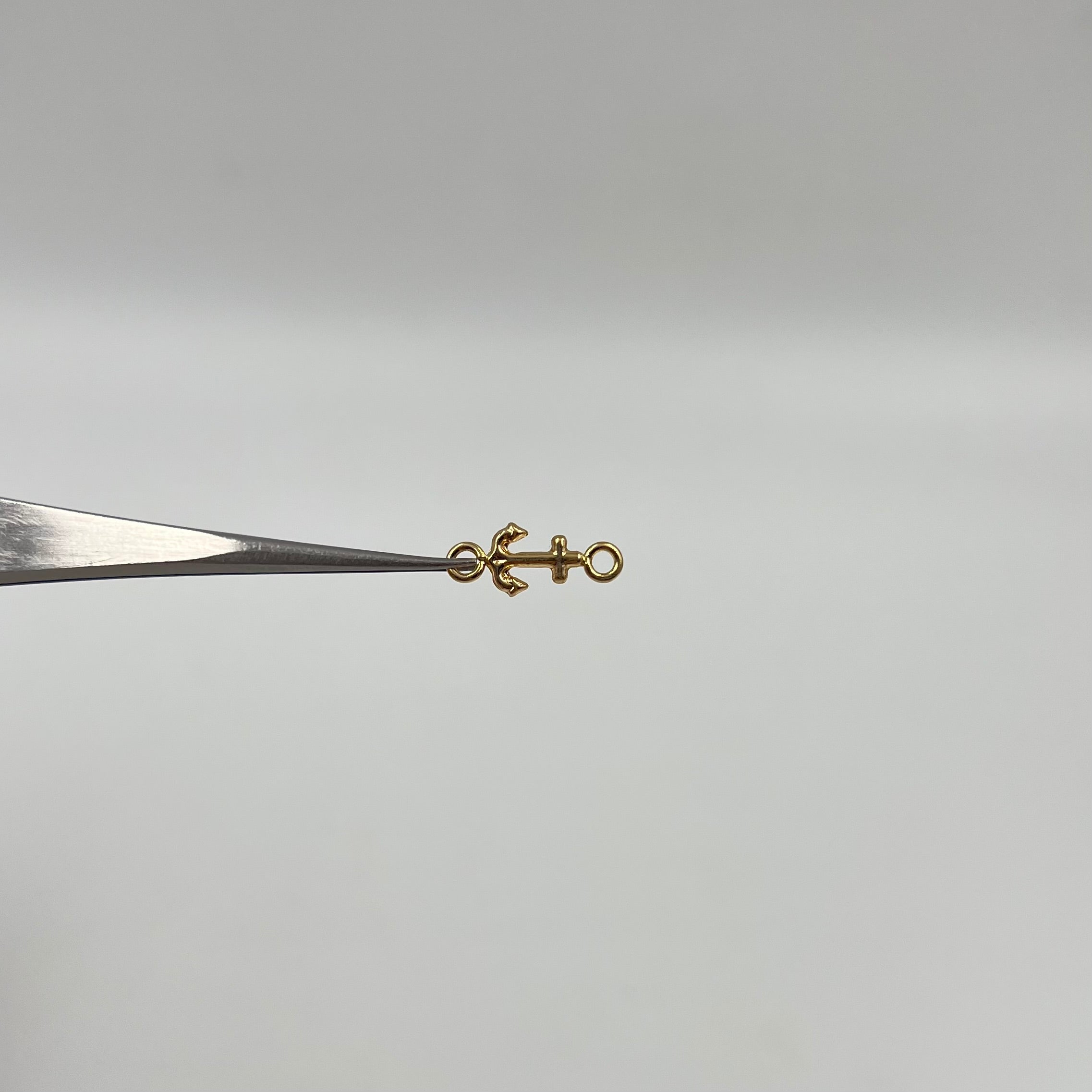 HERRAJE ANCLA ORO AMARILLO 18K 0,22 GR / 0,6 CM