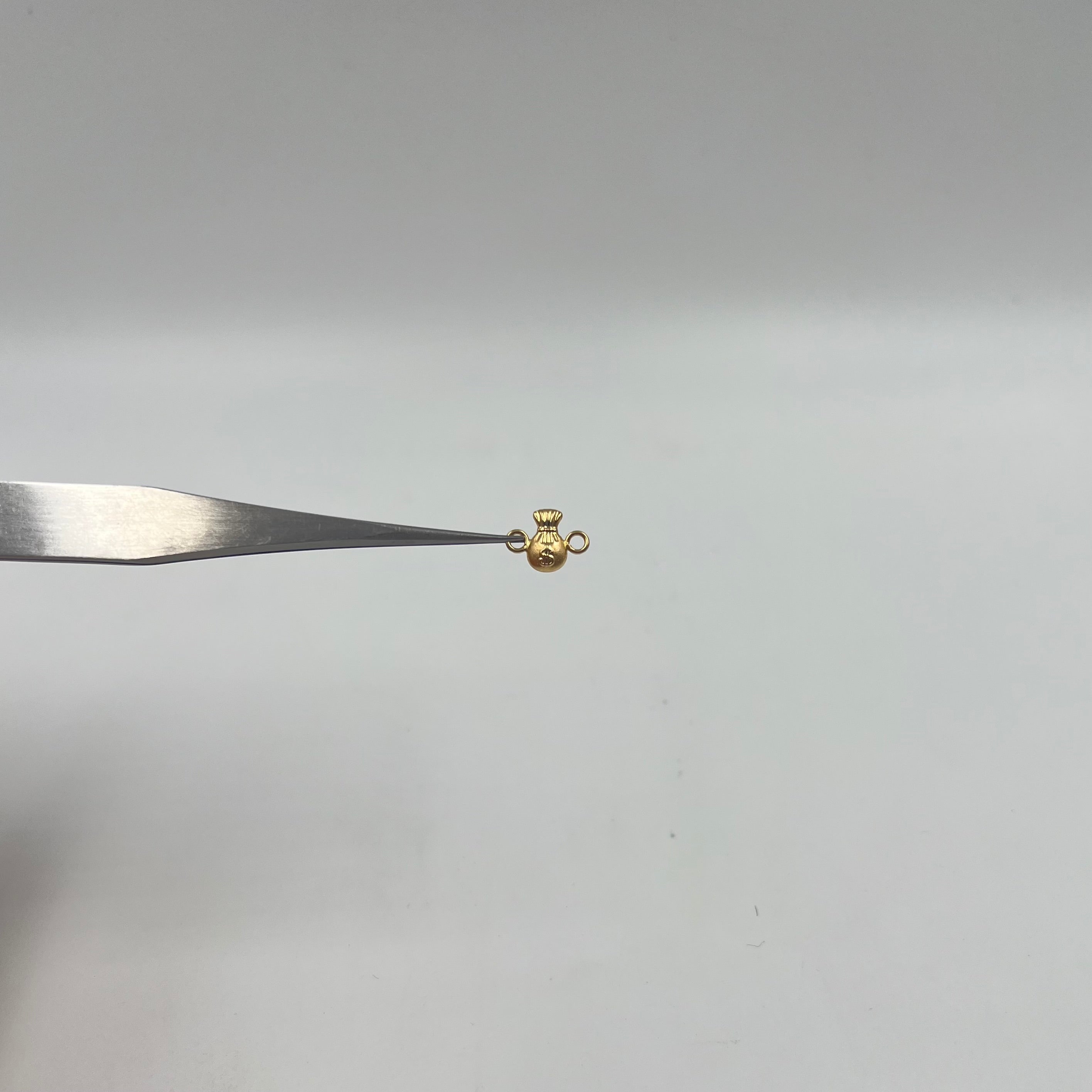 HERRAJE  BOLSA DINERO  ORO AMARILLO 18K 0,32 GR / 1,1 CM