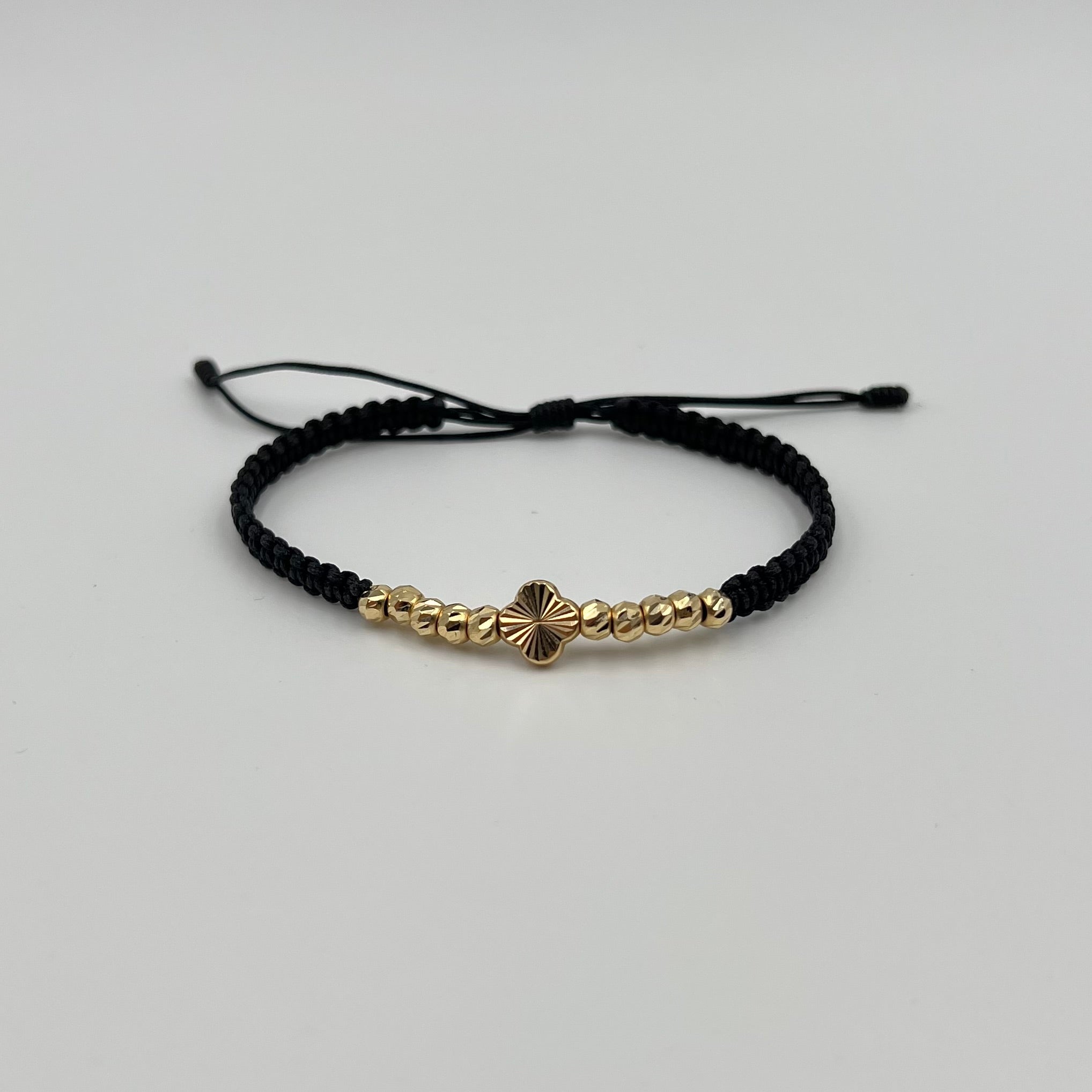 PULSERA TEJIDA NEGRA / HERRAJE TREBOL DIAM / BOLA DIAMANTADA 4MM