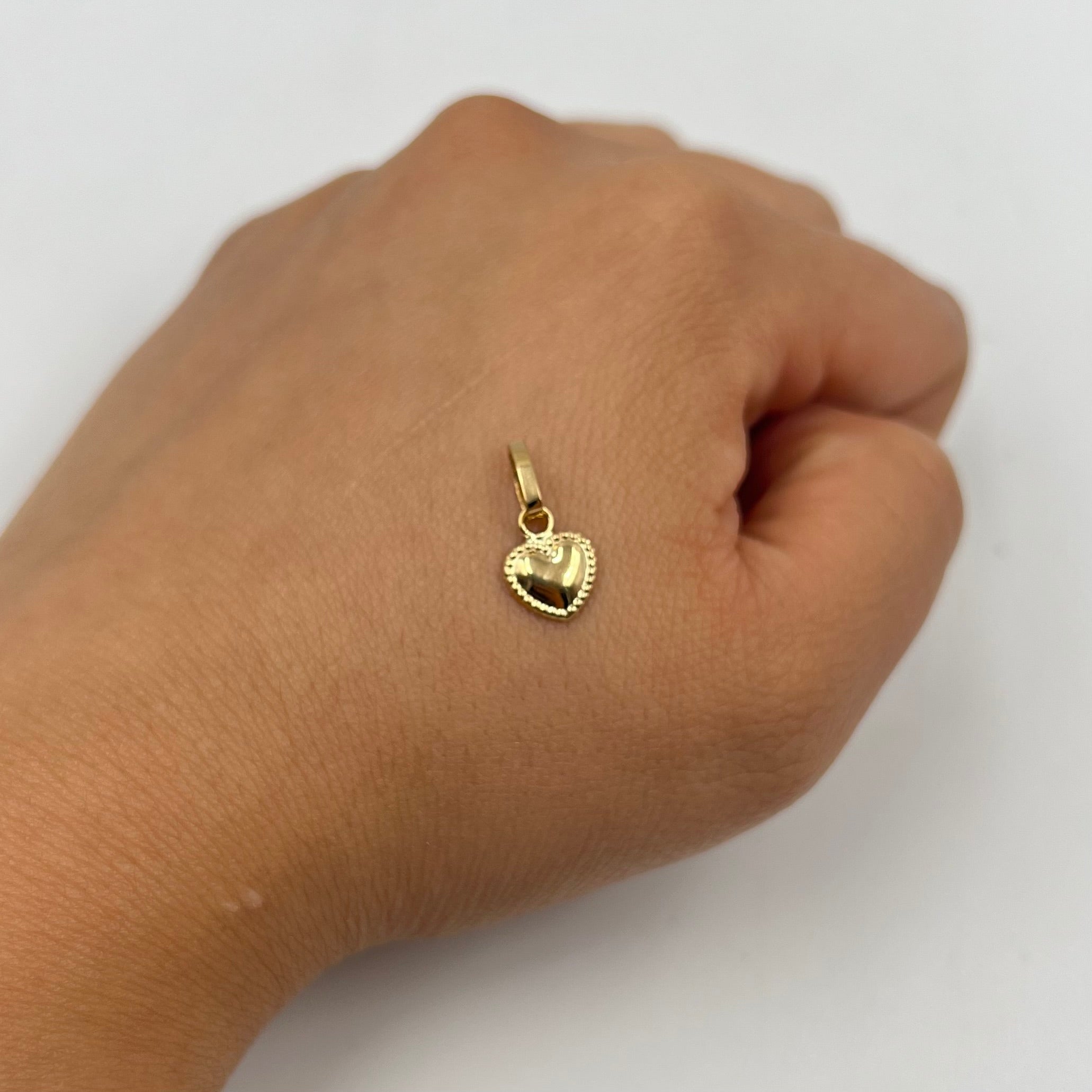 DIJE CORAZON BORDEADO  ORO AMARILLO 18K 0,36 GR / 8 MM / 1 CM