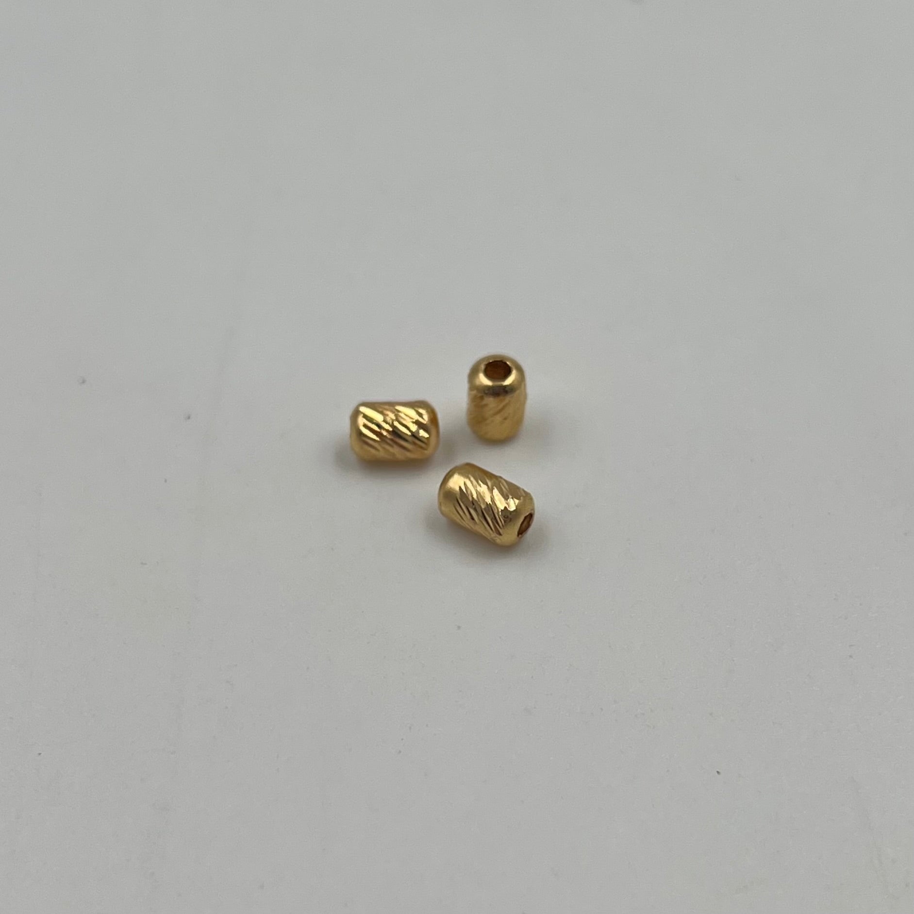 HERRAJE CILINDRO DIAMANTADO REDONDO  ORO AMARILLO 18K 0,16 GR / 0,4 CM