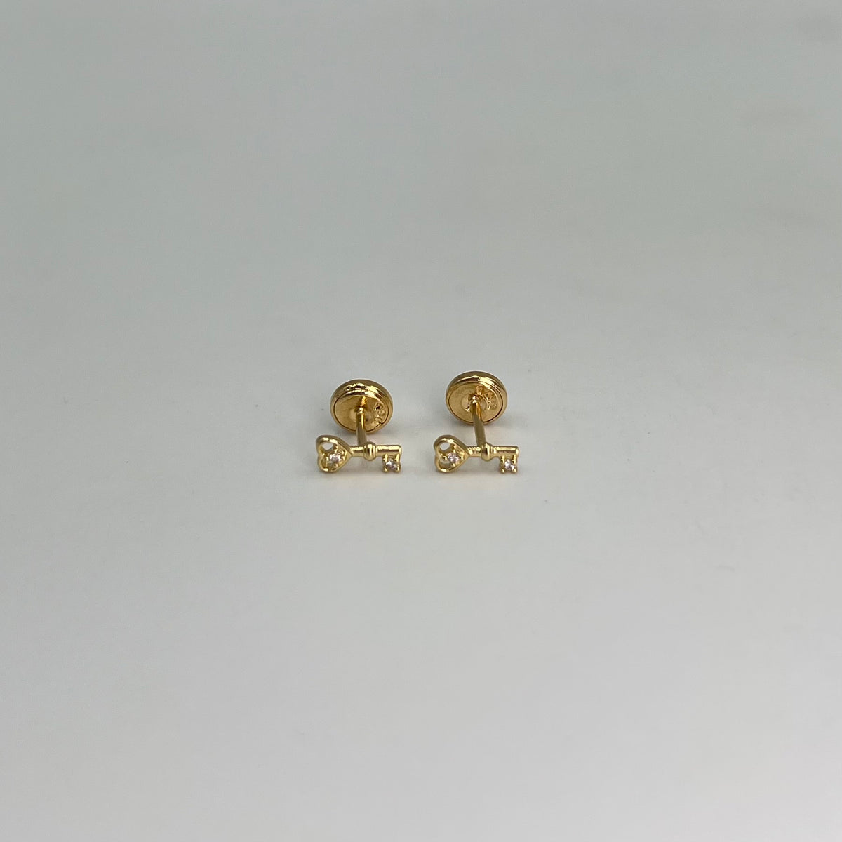 TOPOS LLAVE CORAZON CIRCONES BLANCOS ORO AMARILLO 18K 0,63 GR / 3 MM