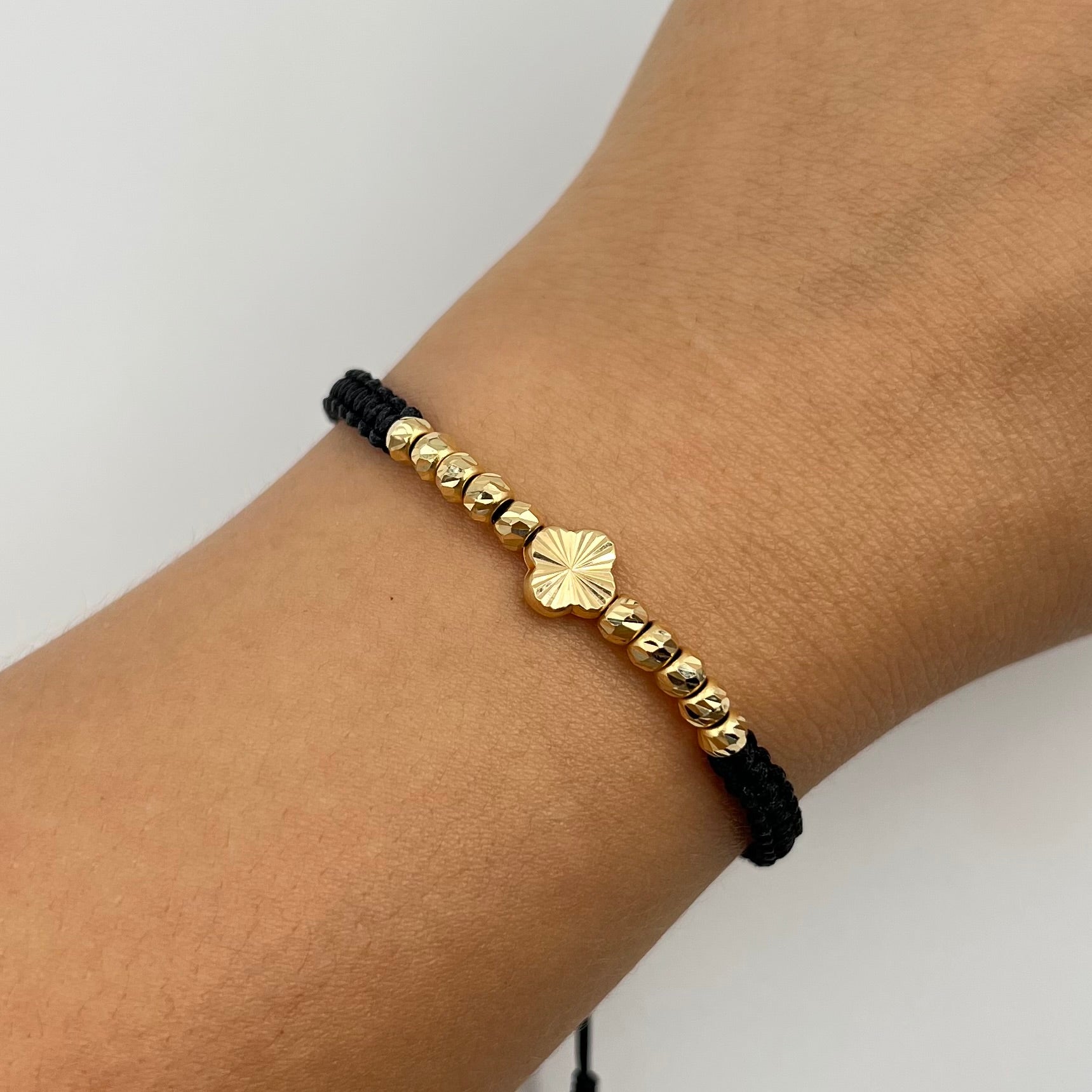 PULSERA TEJIDA NEGRA / HERRAJE TREBOL DIAM / BOLA DIAMANTADA 4MM