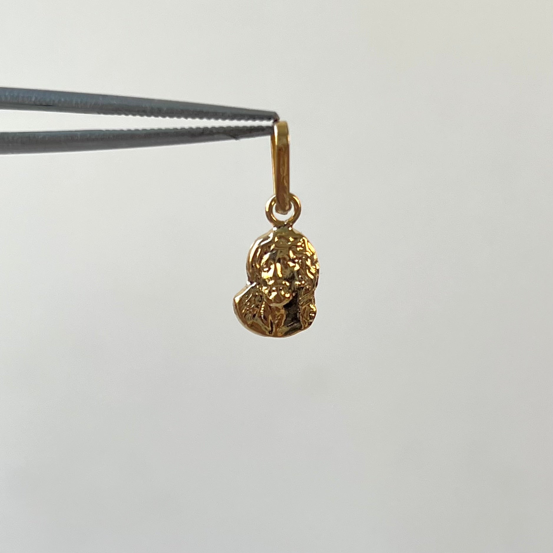 DIJE ROSTRO DE JESUS  ORO AMARILLO 18K 0,34 GR / 1,5 MM / 1,8 CM