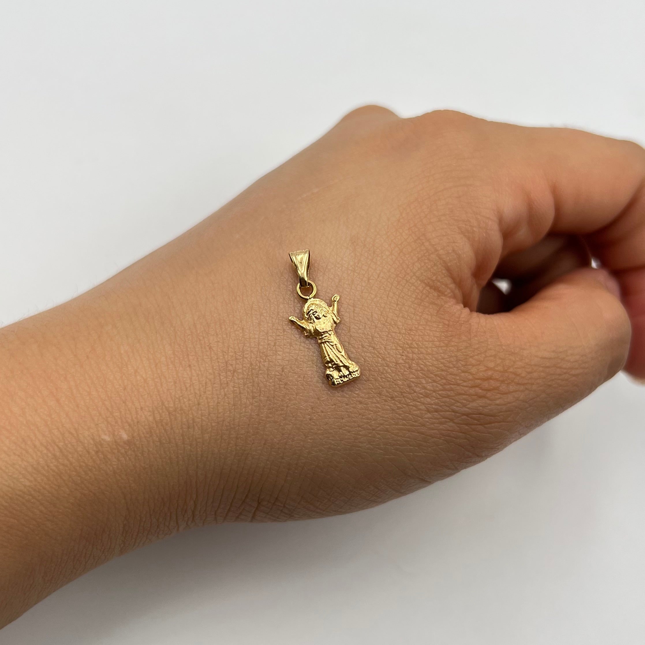 DIJE DIVINO NIÑO  ORO AMARILLO 18K 0,36 GR / 0,8 MM / 1,6 CM