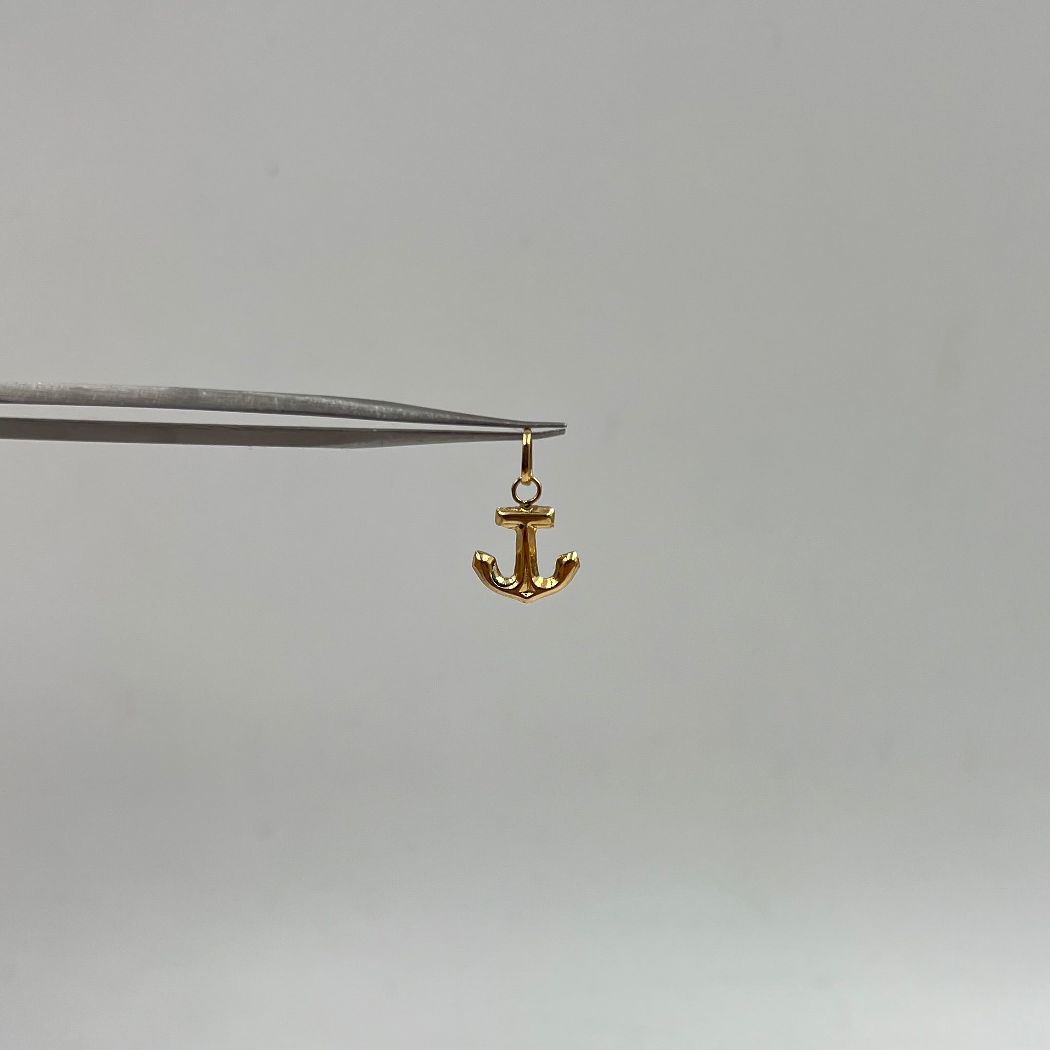 DIJE ANCLA  ORO AMARILLO 18K 0,28 GR / 9 MM / 1,1 CM