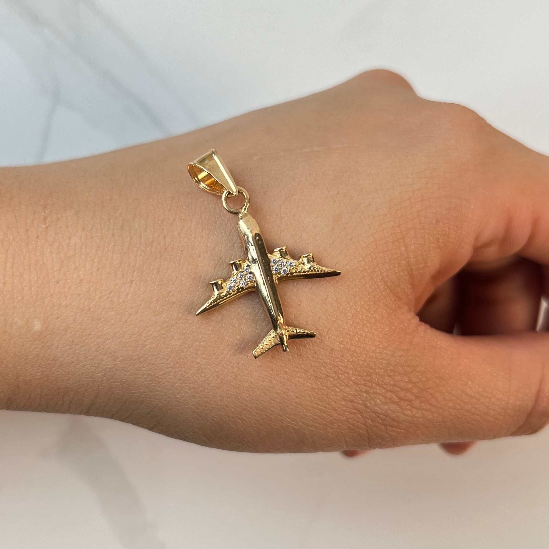 DIJE AVION CON CIRCONES ORO AMARILLO 18K 2,8 GR / 22 MM / 2,6 CM