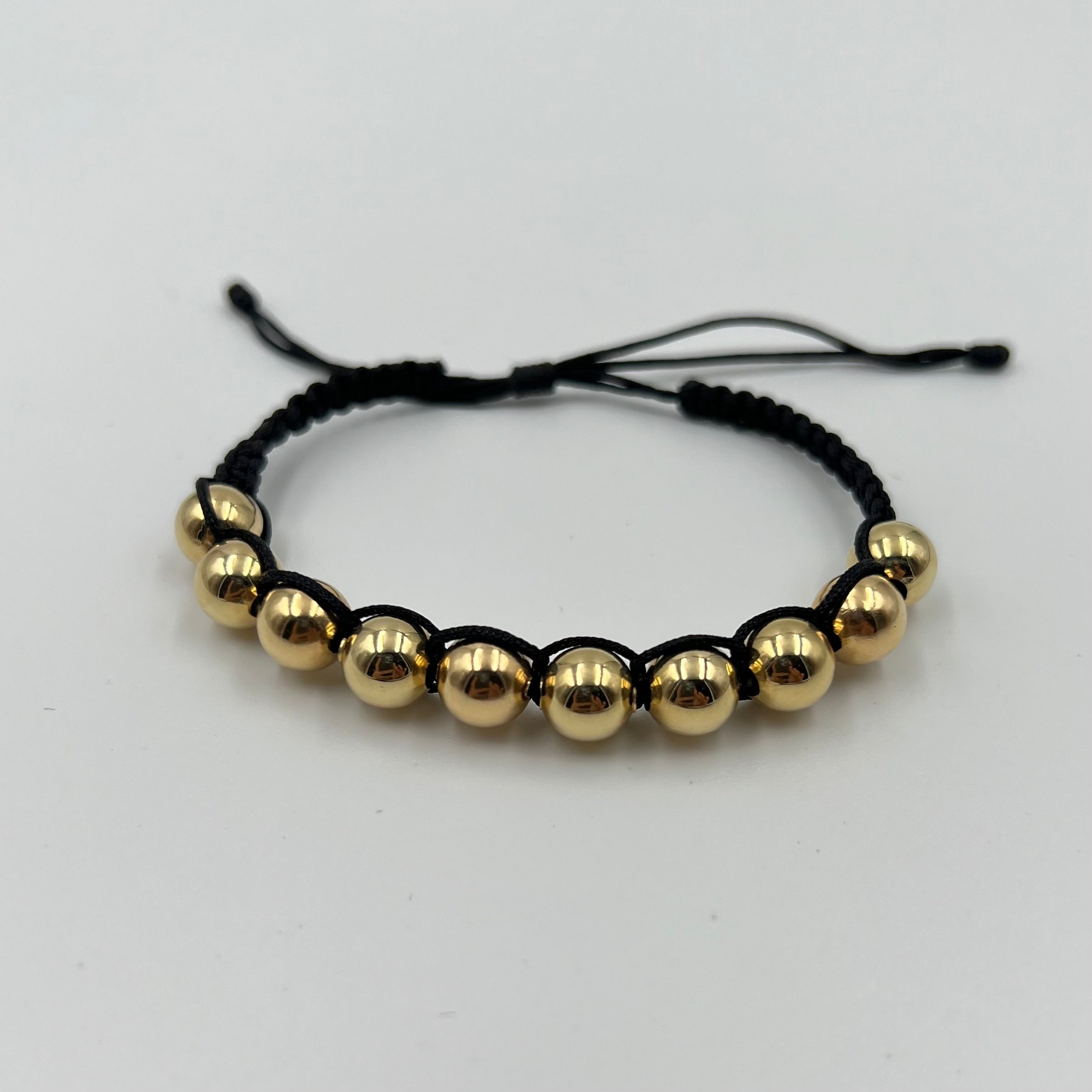 PULSERA TEJIDA NEGRA / BOLA LISA 8MM