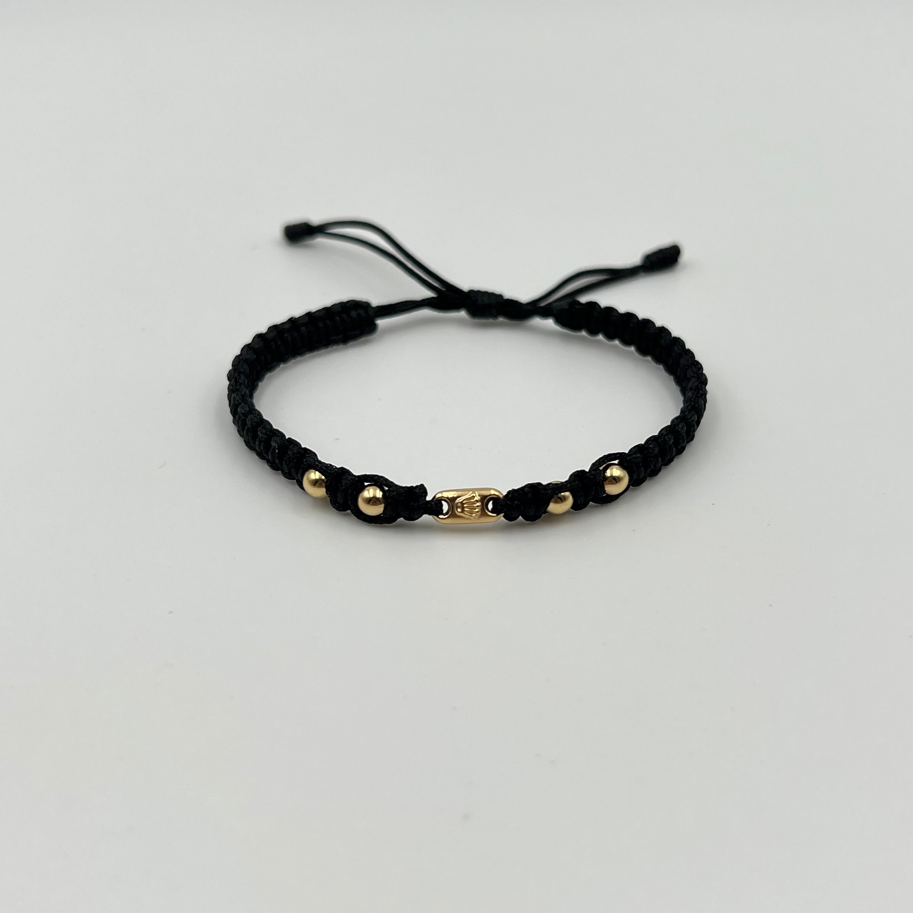 PULSERA TEJIDA NEGRA / HERRAJE RX / BOLA LISA 4MM