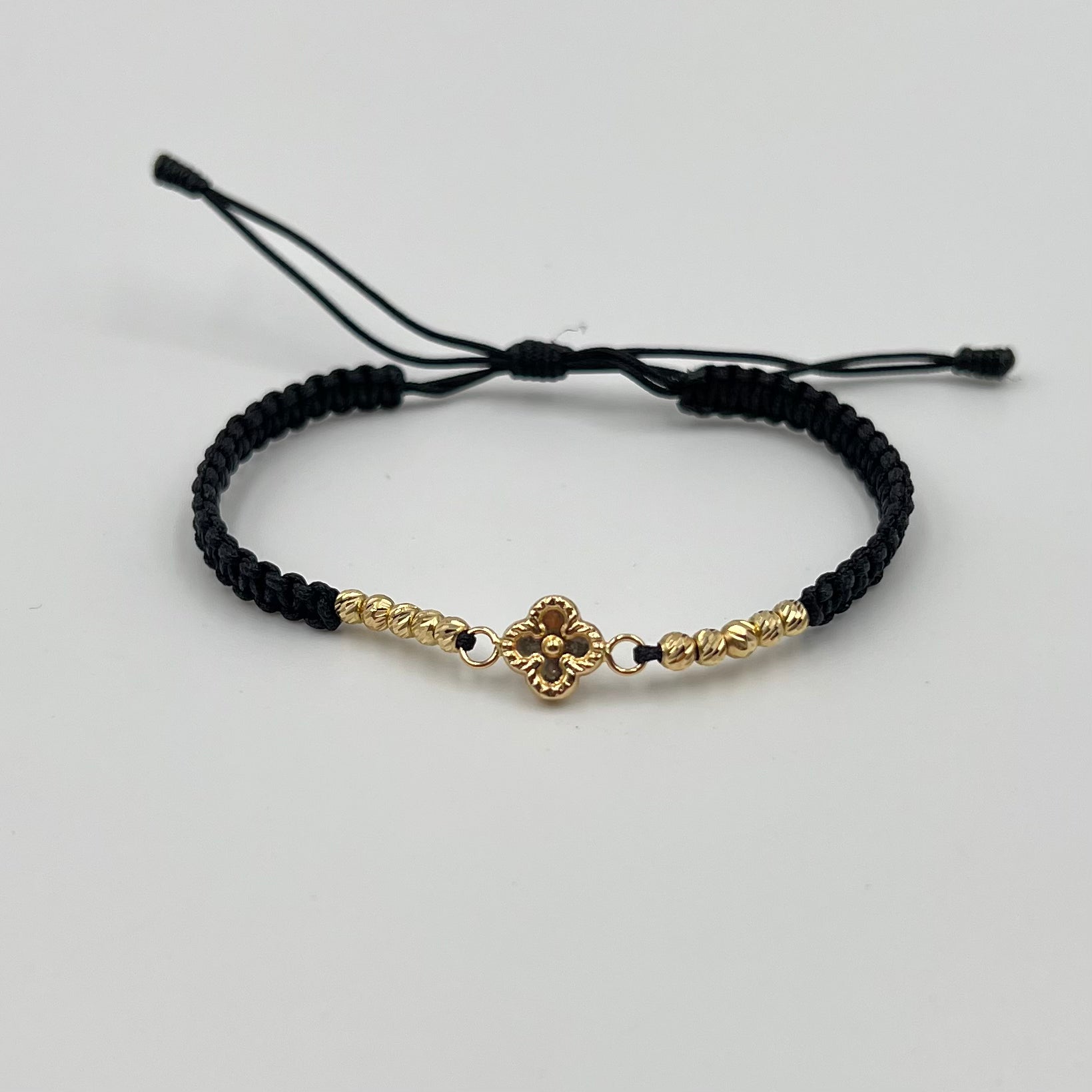 PULSERA TEJIDA NEGRA / HERRAJE TREBOL / BOLA DIAMANTADA 3MM