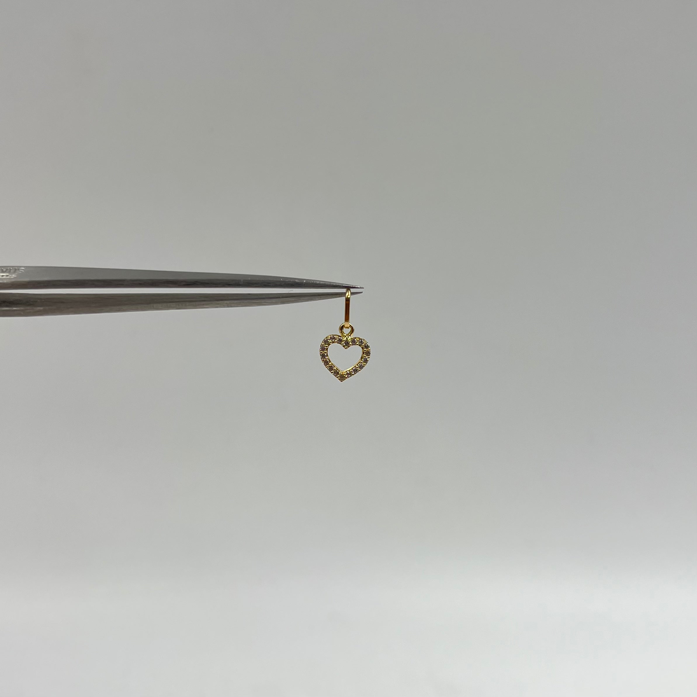 DIJE CORAZON SILUETA CASTING BLANCO  ORO AMARILLO 18K +1 / 0,43 GR / 9 MM / 1 CM